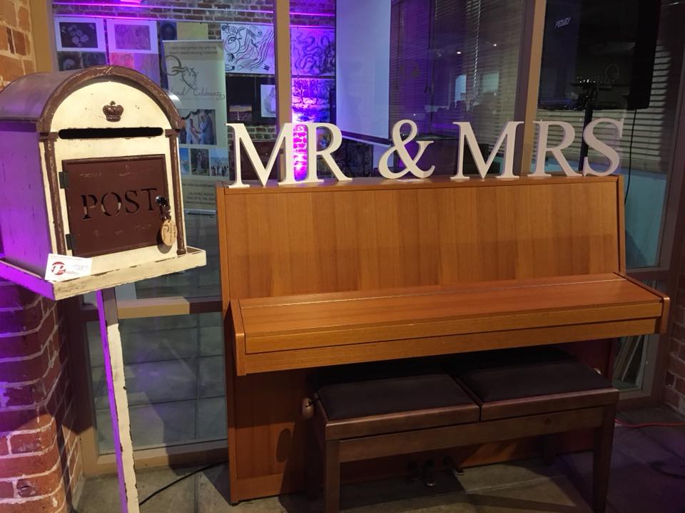 Wedding reception decor: Mailbox and piano with 