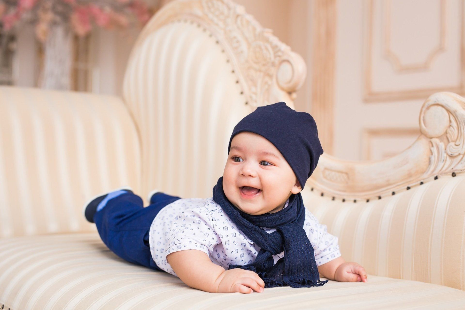 Baby photographed on couch