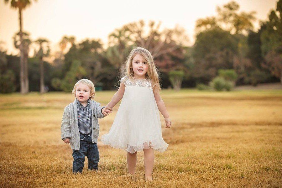 Children walking in field
