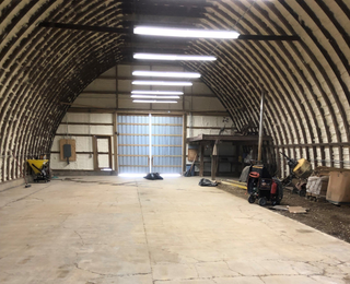 Man Installing Thermal Roof Insulation Layer — Betz Insulation — Schnellville, IN