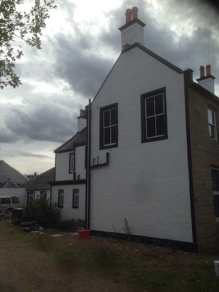 Exterior wall painting by DC Roofcare