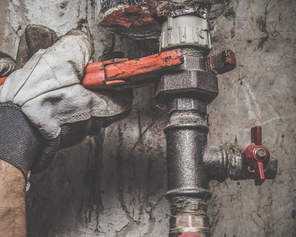 plumber fitting the pipe