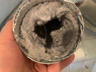 dryer vent filed with dust
