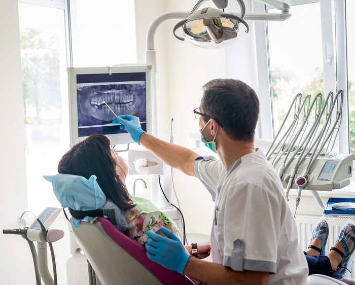 Dentist And Patient Talking About Dental X-Ray — Kingston, NY — Joseph Diacovo, DMD Dentist And Patient Talking About Dental X-Ray — Kingston, NY — Joseph Diacovo, DMD