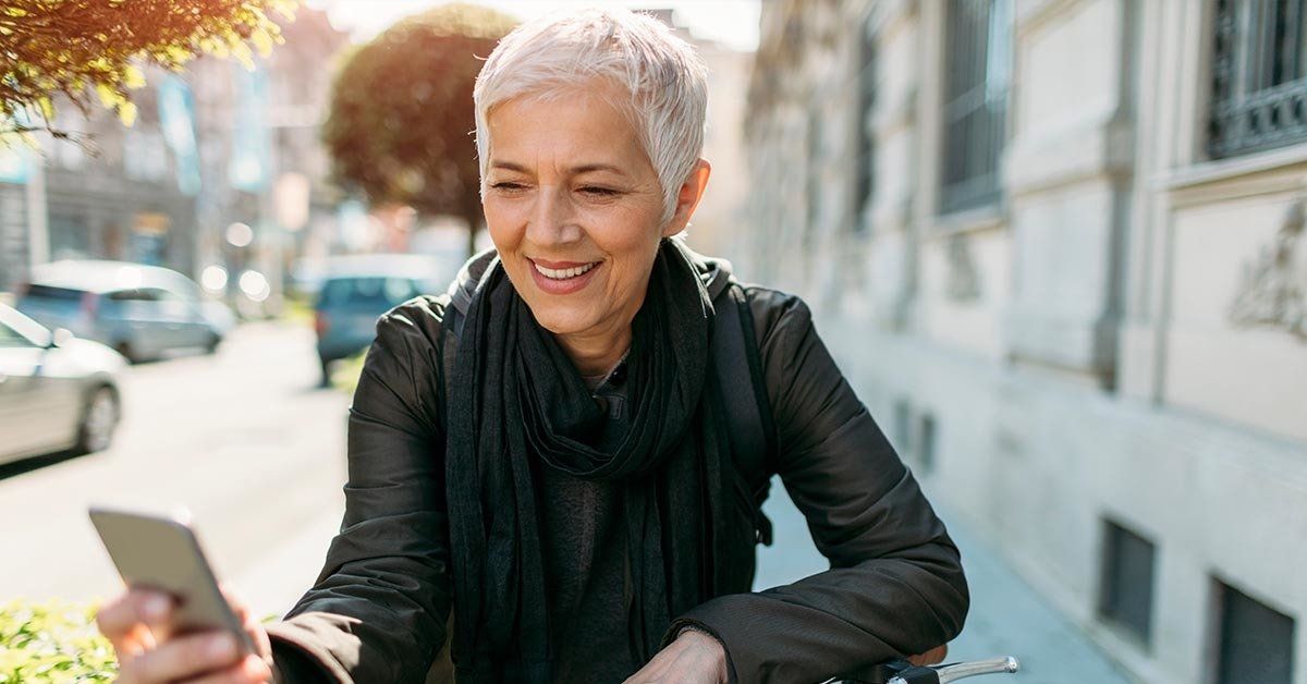 happy woman with hearing aids