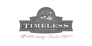 Logo for Timeless Wood Floors, featuring a stylized graphic of a wood-cutting tool and text.