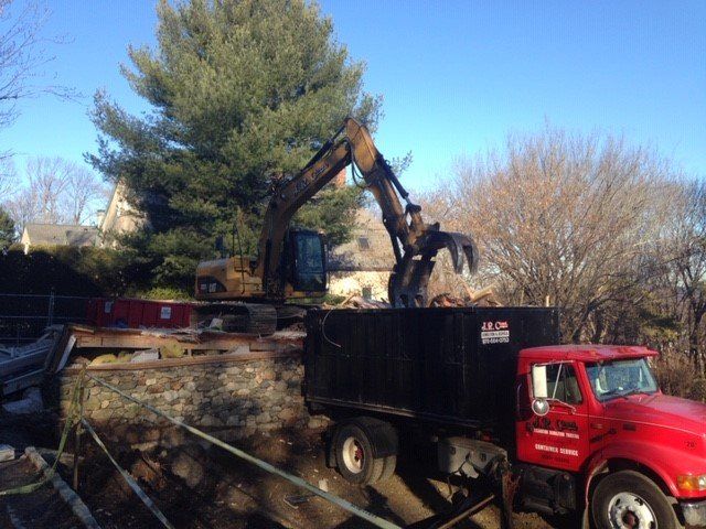 Dumpster for Rent — North Reading, MA — J.R. and Sons Construction, Inc. Dumpster for Rent — North Reading, MA — J.R. and Sons Construction, Inc.