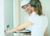 electrician checking alarm system