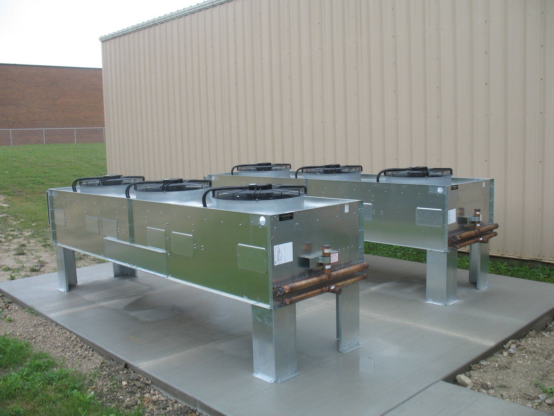 Condenser Setting onto Concrete Pad