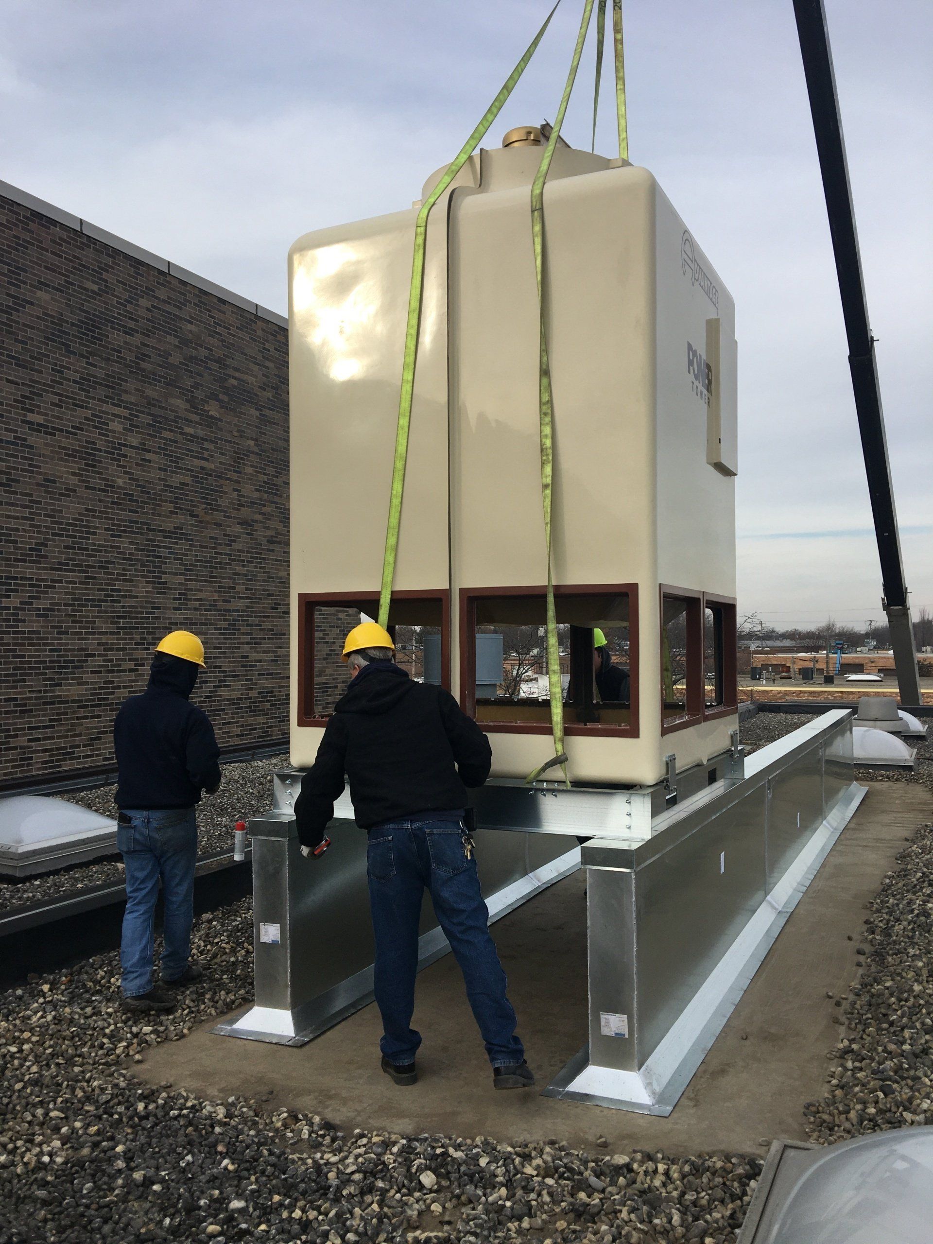 Cooling Tower setting onto Roof Curbs