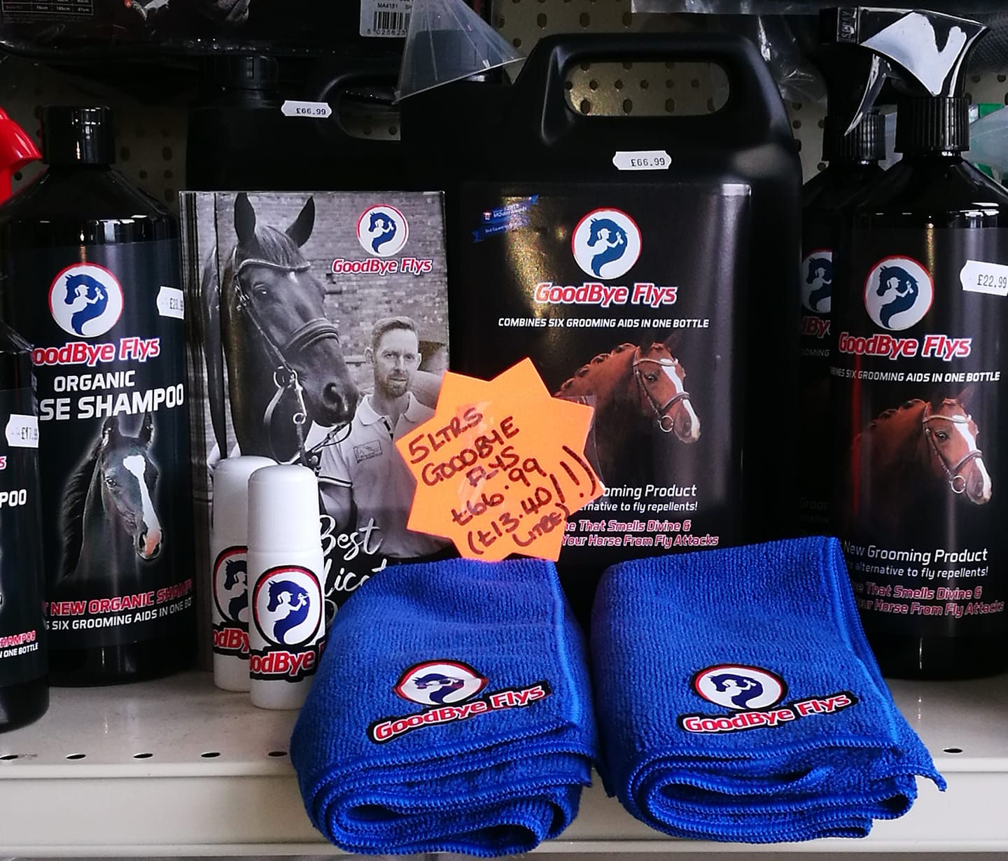 several goodbye flys products are displayed on a shelf