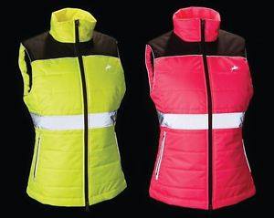 two vests , one yellow and one red , are on a mannequin on a black background .