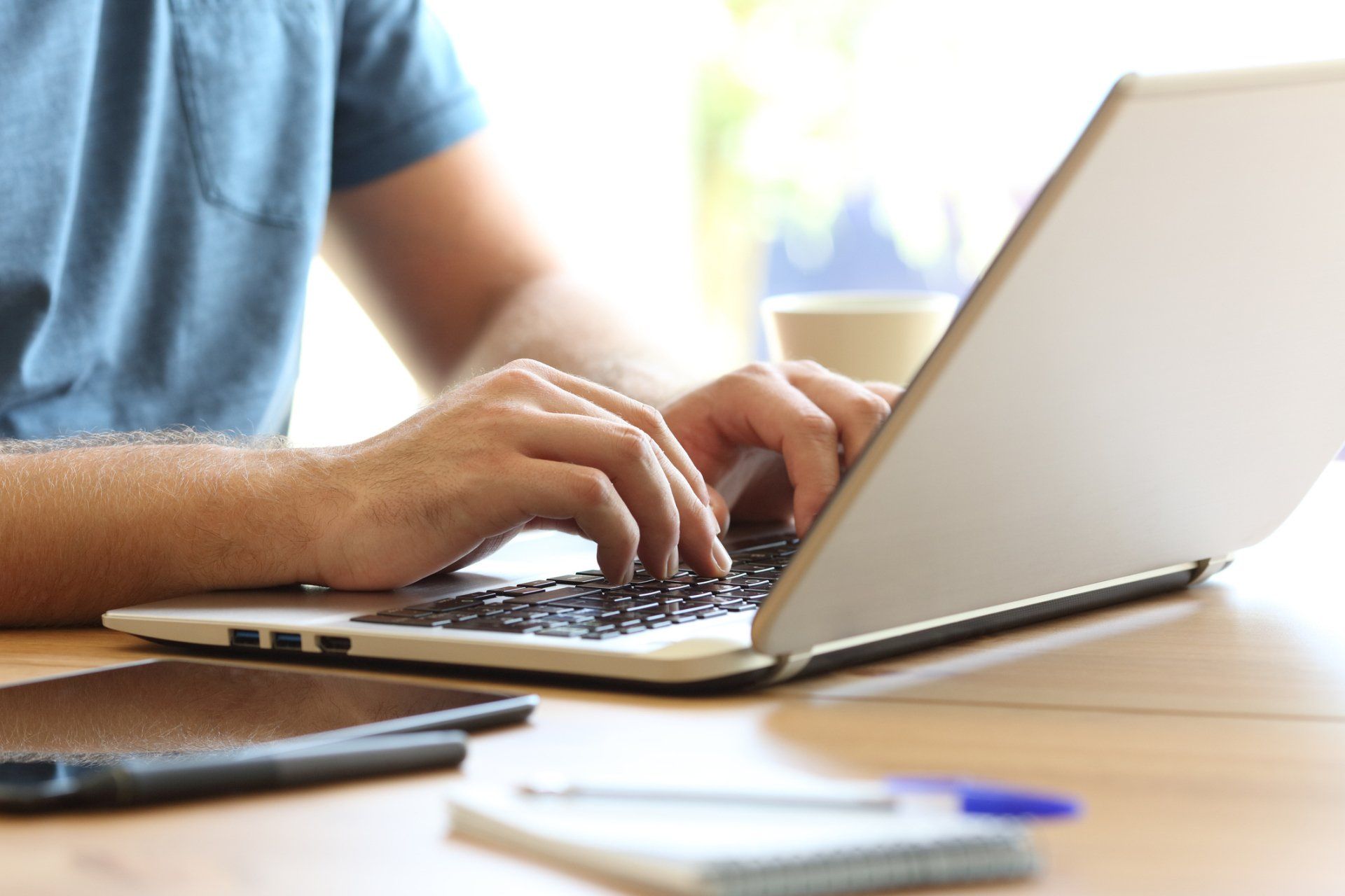 Laptop on table - pay rent