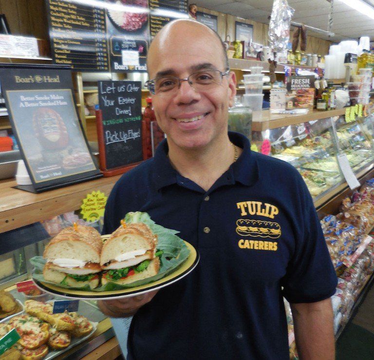man holding burger
