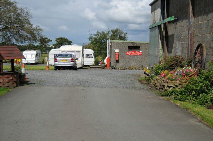 caravan in front of a building