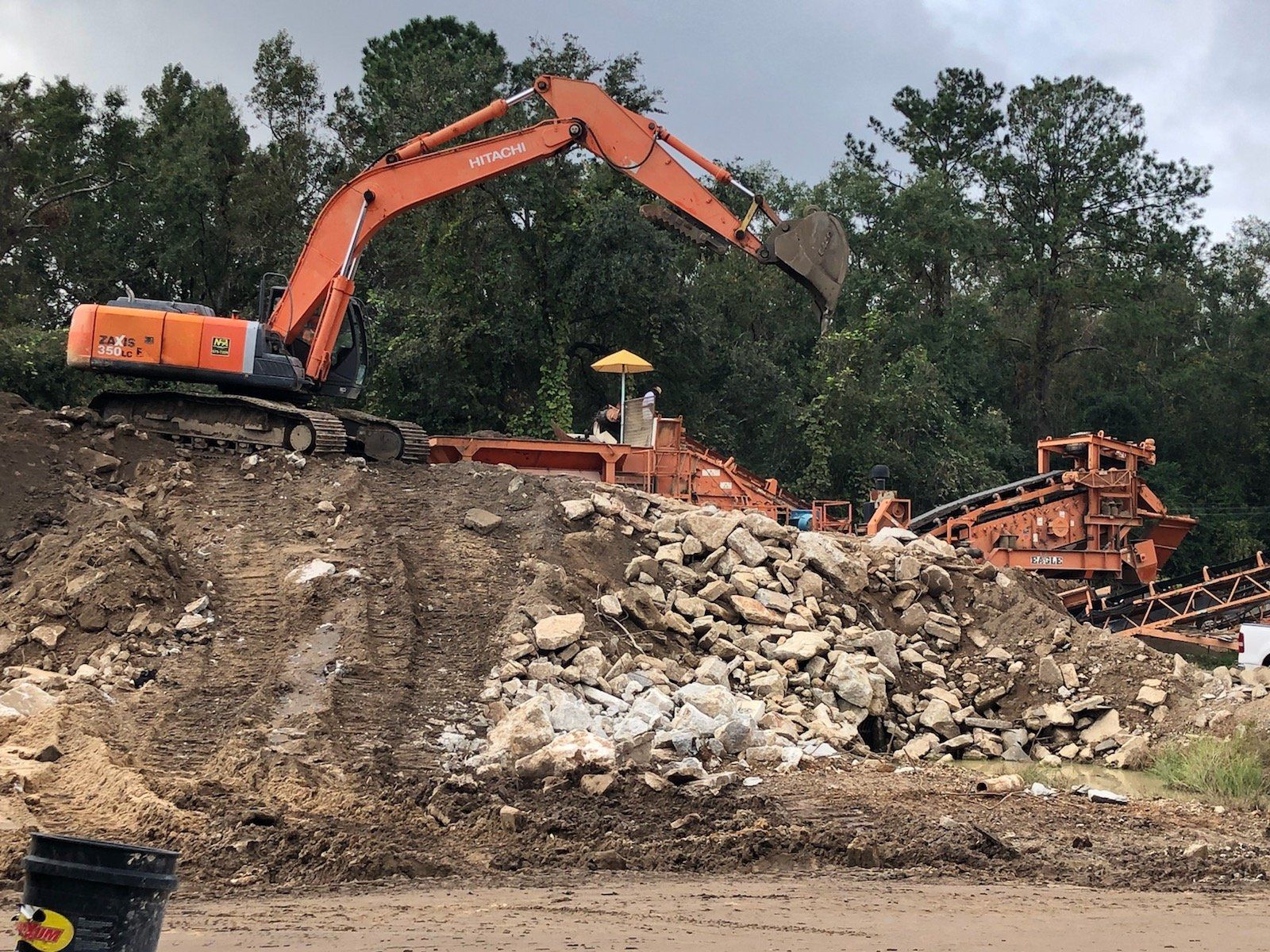 Storm Water — Heavy duty road building. Hot Asphalt being laid in Tallahassee, FL Storm Water — Heavy duty road building. Hot Asphalt being laid in Tallahassee, FL
