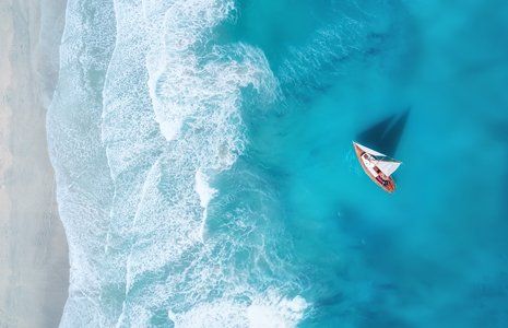 Travel Agent — Yacht On The Water Surface From Top View in Greenville, TX Travel Agent — Yacht On The Water Surface From Top View in Greenville, TX