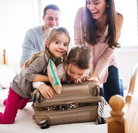 Travel Company — Family Getting Ready For A Vacation in Greenville, TX Travel Company — Family Getting Ready For A Vacation in Greenville, TX