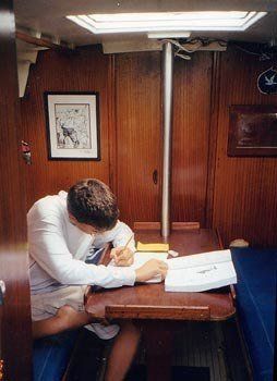 Photo of a boy writing on a boot