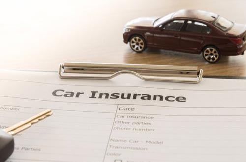 Teen Car Insurance — Car Insurance Form and a Toy Car in Gallup, NM Teen Car Insurance — Car Insurance Form and a Toy Car in Gallup, NM