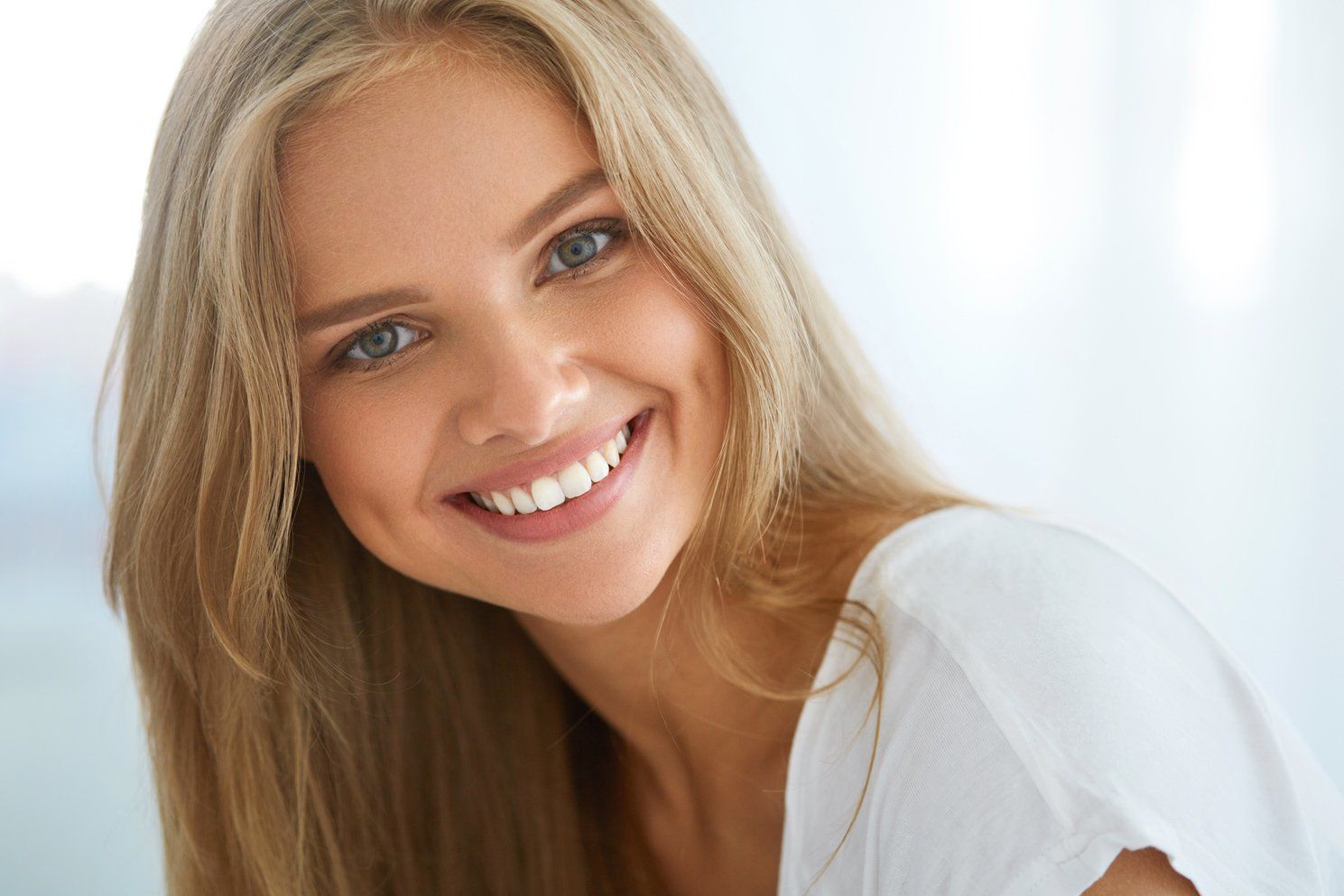 Girl smiling white shirt