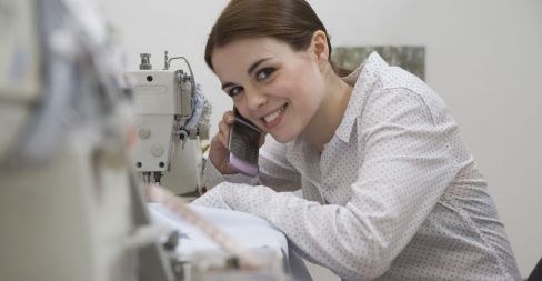 Woman with a sewing machine in Perth
