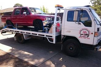 Tow truck towing red truck tow truck towing red truck