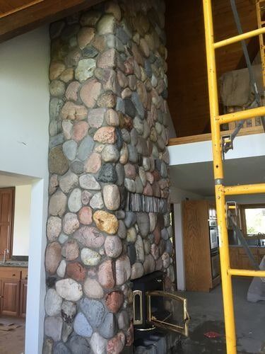River rock fireplace - Custom rock face fireplace in Columbus, NE
