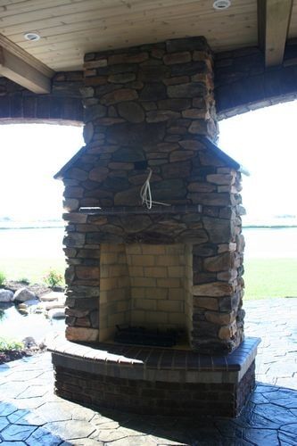 Stone outdoor fireplace - Outdoor fireplace construction in Columbus, NE