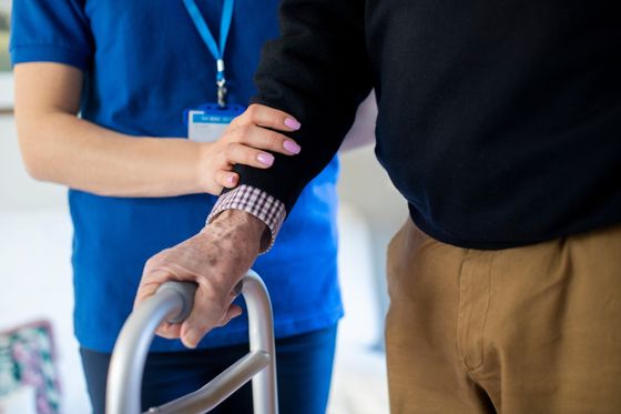 Nurse Supporting Old Man Walk — West Palm Beach, FL — A to Z Senior Care, LLC