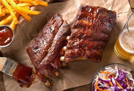 Good Food — Barbecue Ribs With Sauсes in Garden City, KS Good Food — Barbecue Ribs With Sauсes in Garden City, KS