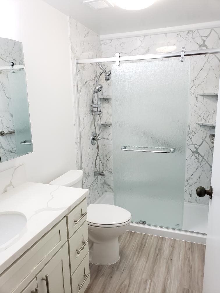 Calcutta Marble Wall Walk In Shower