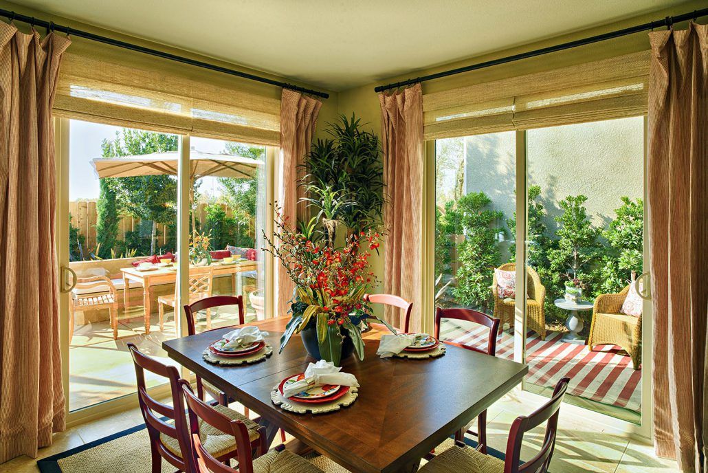 Monte Verde Series Door In Living Room with Dining Table and Chairs