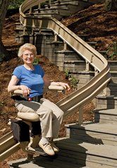 Stairlifts — Man and Woman in Camera in Napa, CA Stairlifts — Man and Woman in Camera in Napa, CA