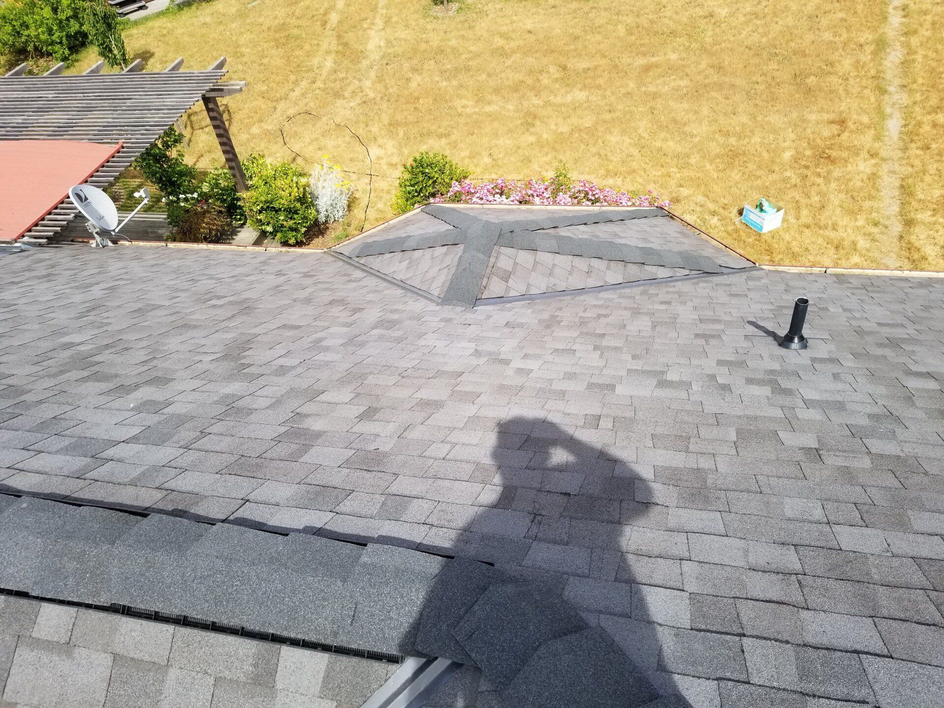 Silhouette of the Person on Top of the Roof — Sebastapol, CA — Alpine Roofing Co