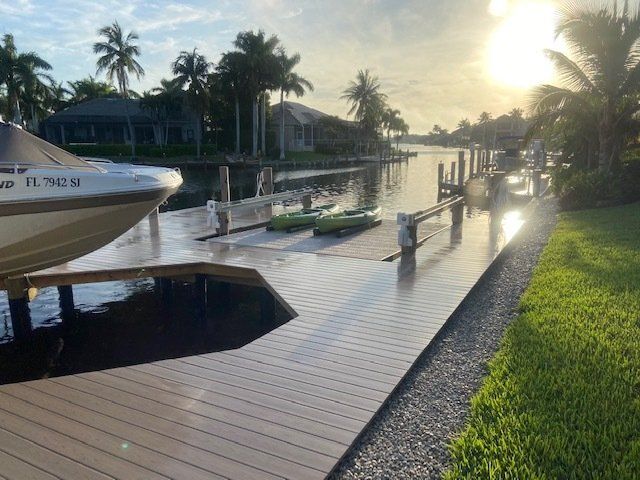 Shiny Wooden Deck — Marco Island, FL — Collier Seawall & Dock