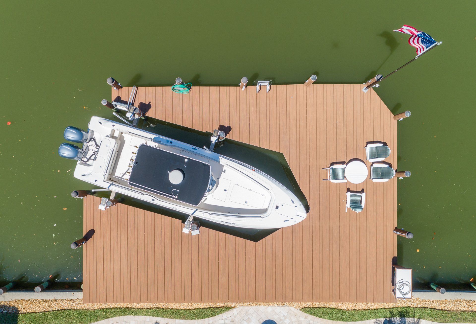 Parked Boat — Marco Island, FL — Collier Seawall & Dock