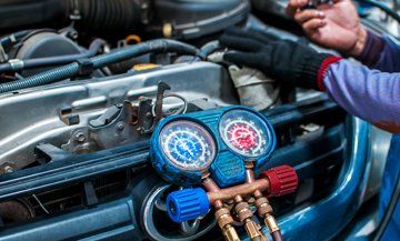 mechanic working on air conditioning
