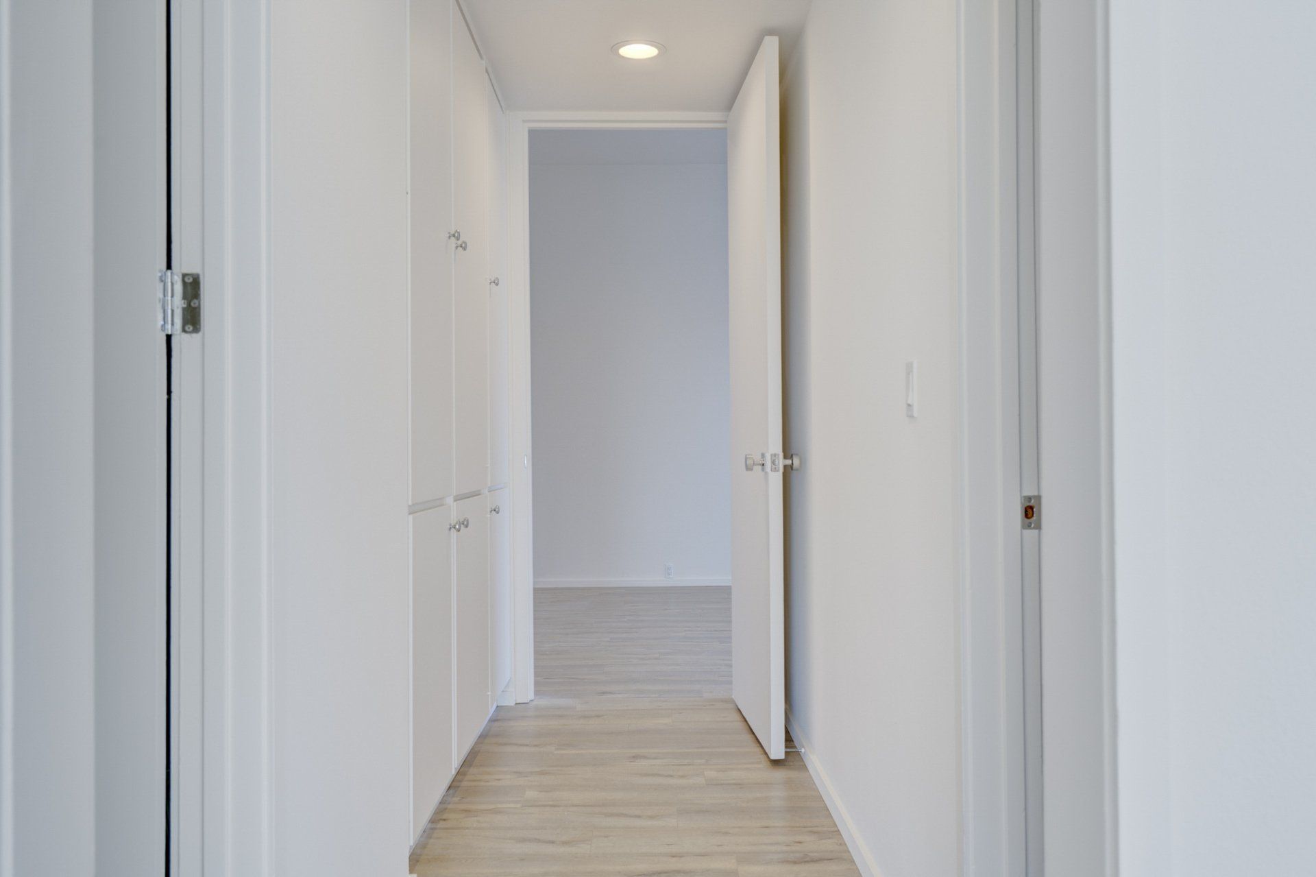 Interior view of hallway and white walls