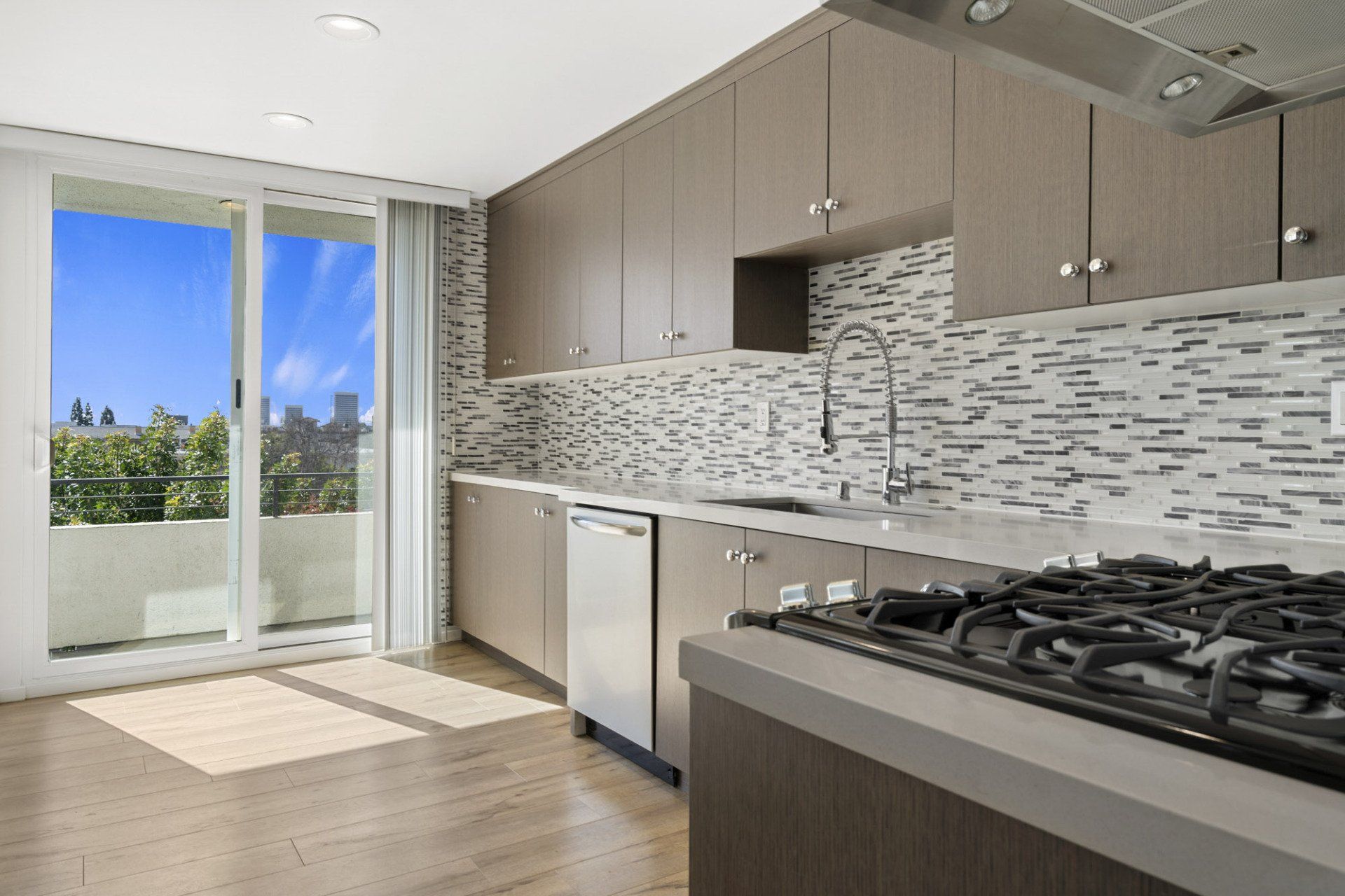 Interior of kitchen with tile backsplash and large counter space
