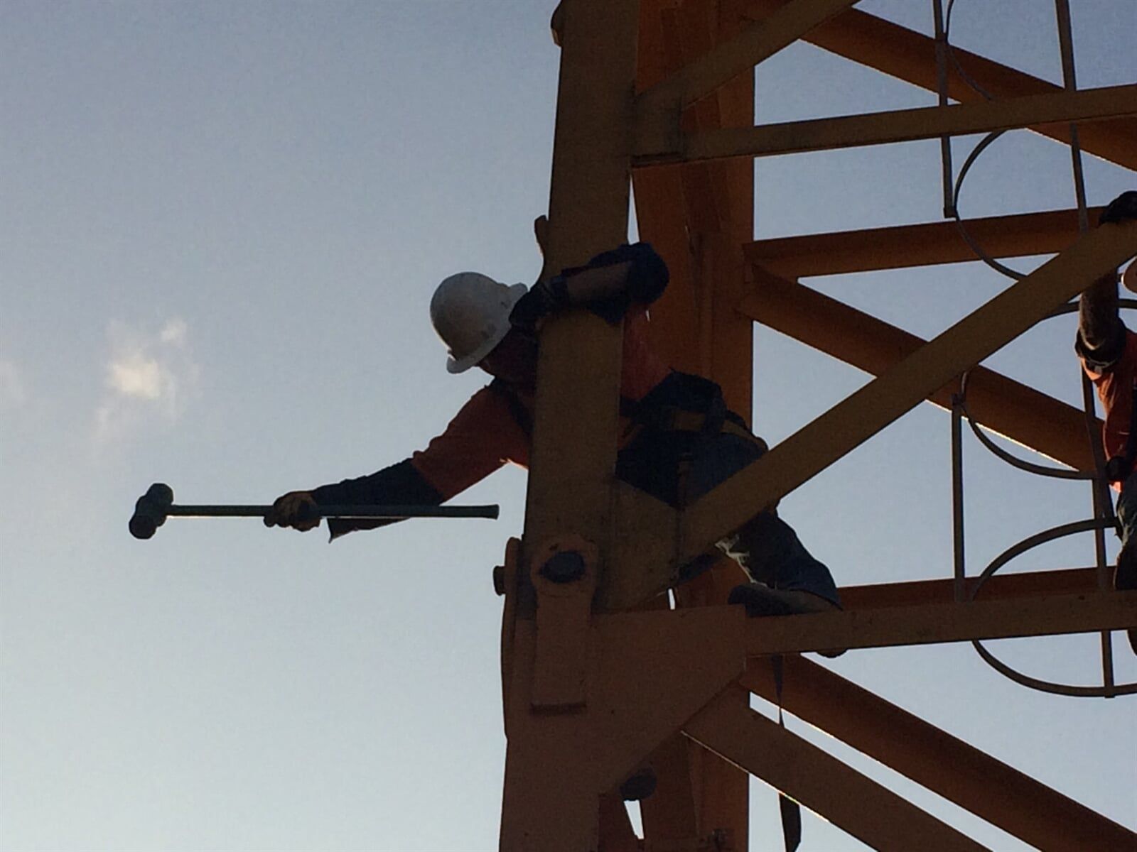Man On Metal Rigging - Crane Hire in Townsville, QLD Man On Metal Rigging - Crane Hire in Townsville, QLD