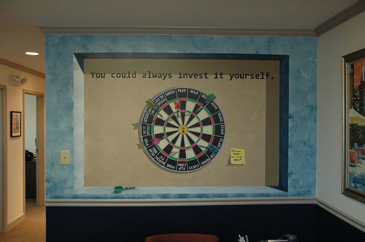 A dart board on a wall with the words you could always invest it yourself