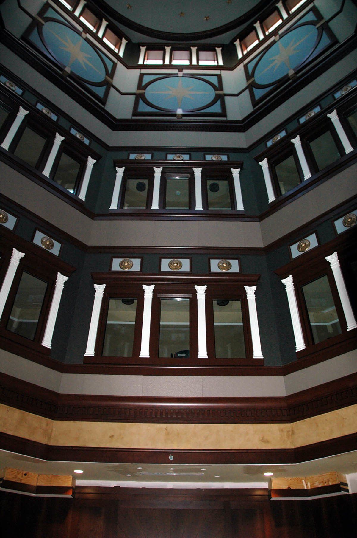 Looking up at the ceiling of a building with many windows