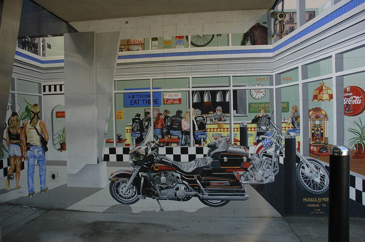 A painting of a harley davidson motorcycle in a diner