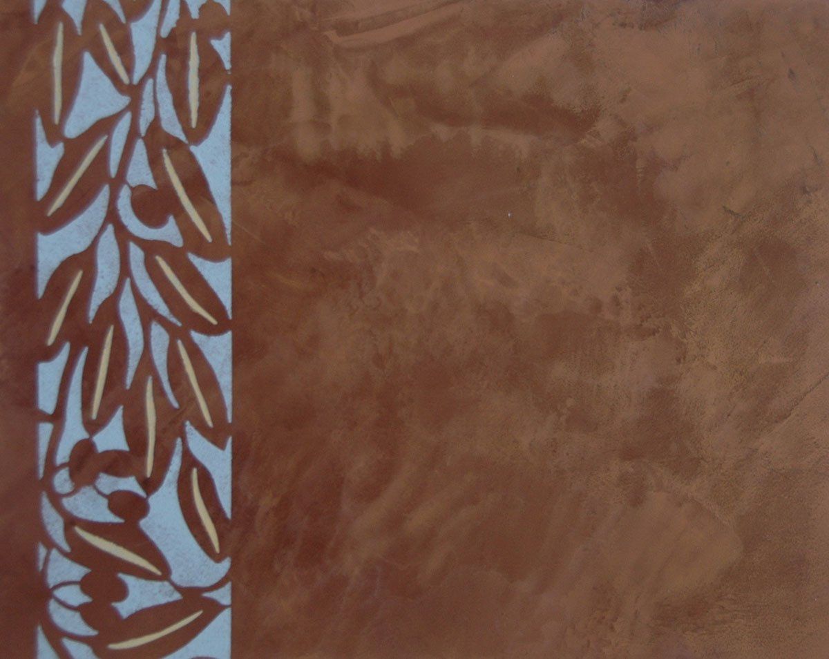 A brown background with a blue leaf design on it