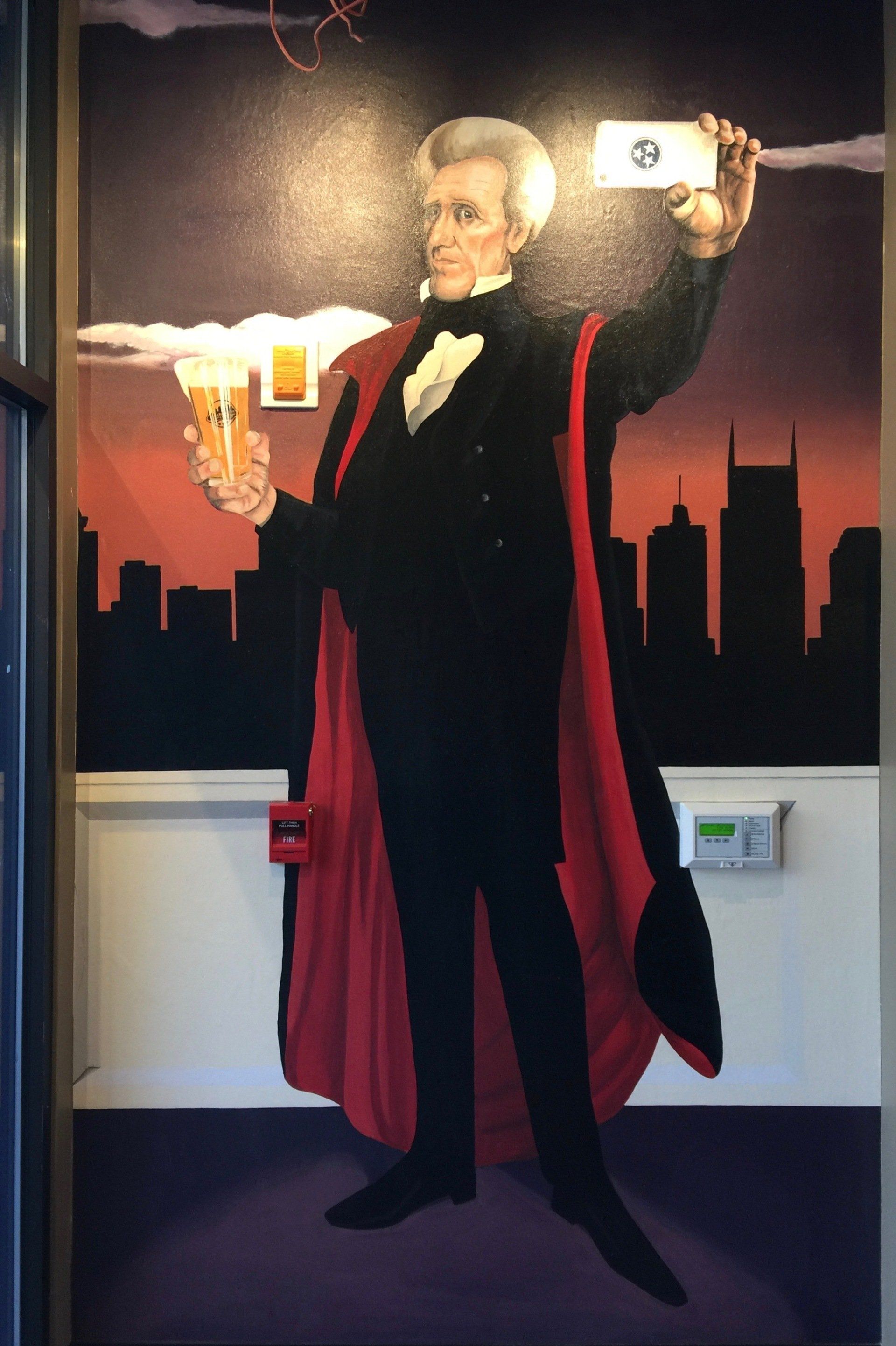 A painting of a man in a red cape holding a beer