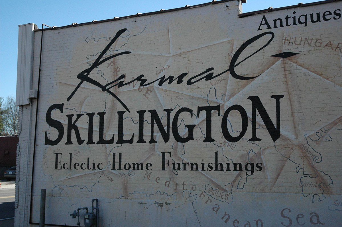 A sign for karma skillington electric home furnishings