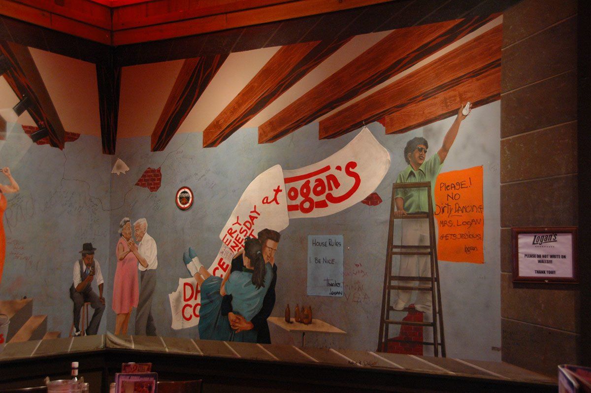 A painting on a wall that says ' egan 's ' on it