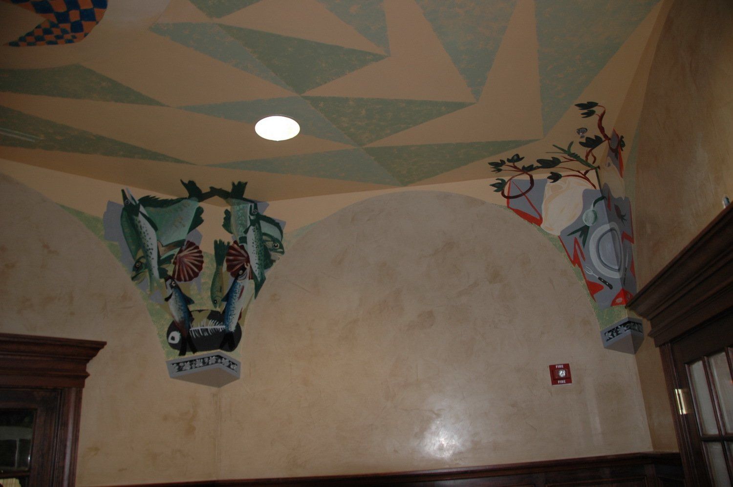 A room with a ceiling that has a painting on it