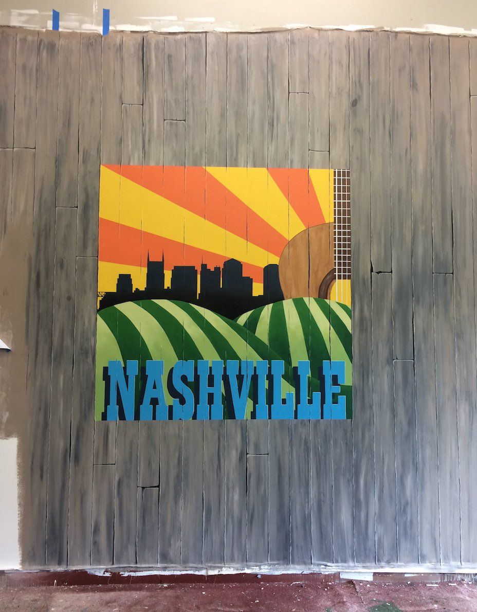 A painting on a wall that says nashville